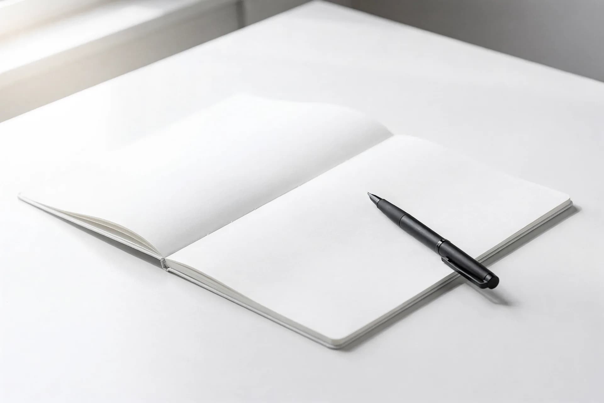 Open notebook and pen — frequently asked